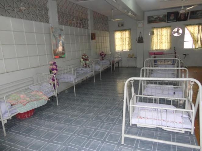 Cribs at creche for abandoned children at Edhi clinic in Karachi, Pakistan. 